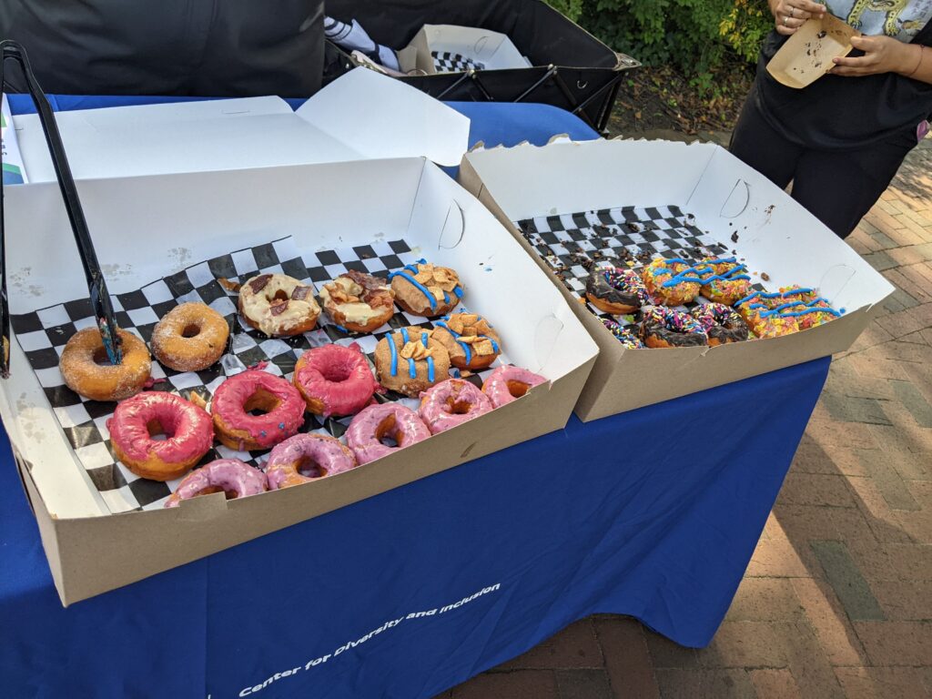 Two boxes of donuts on a table