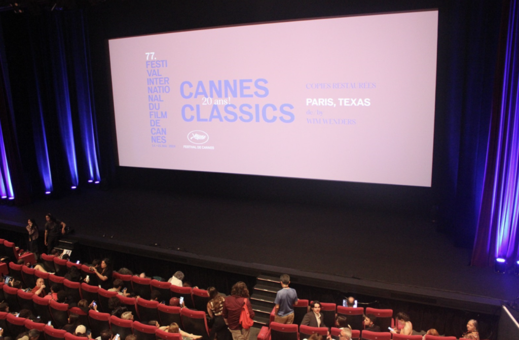 A movie theatre screen reading "Cannes Classics" 