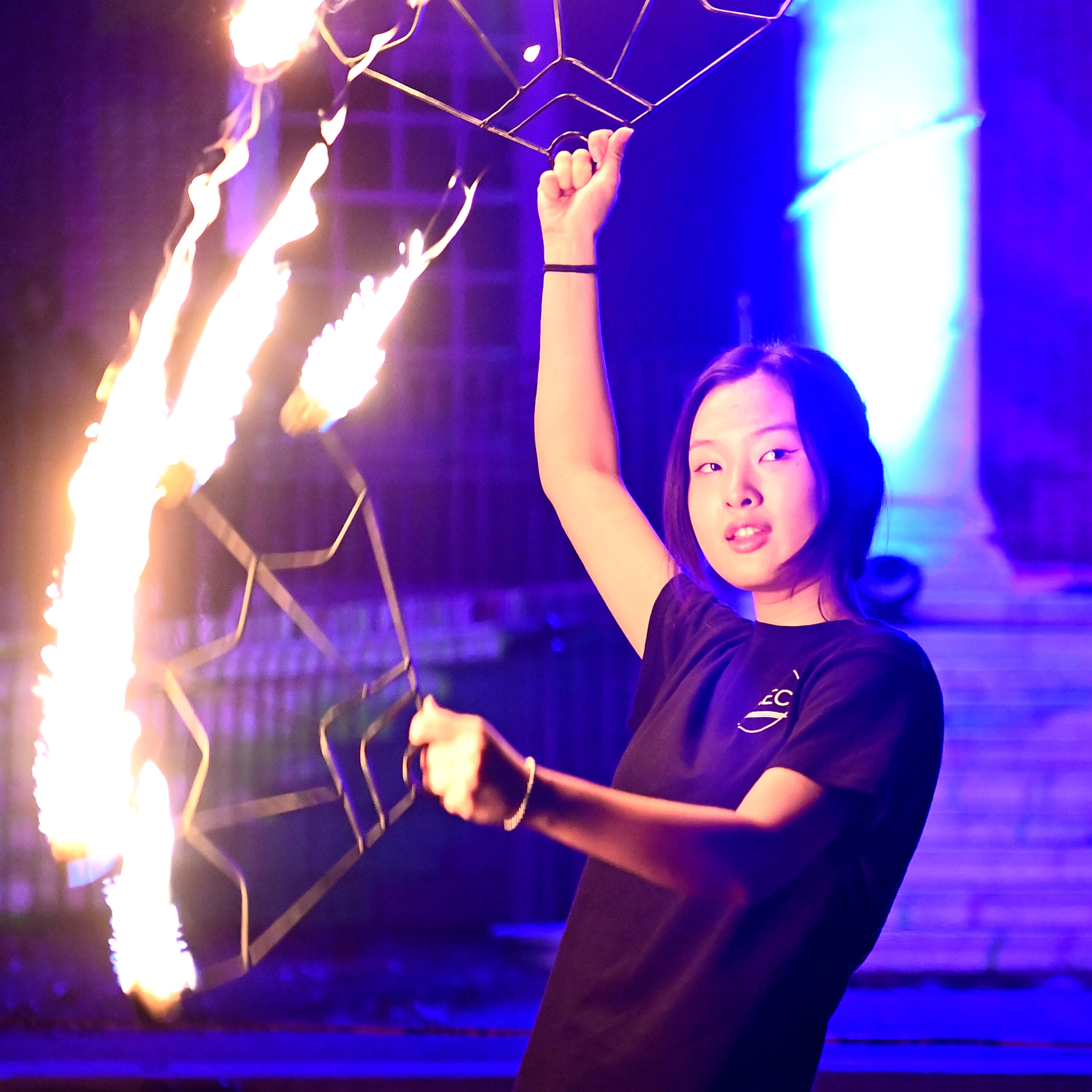 Student spinning fire