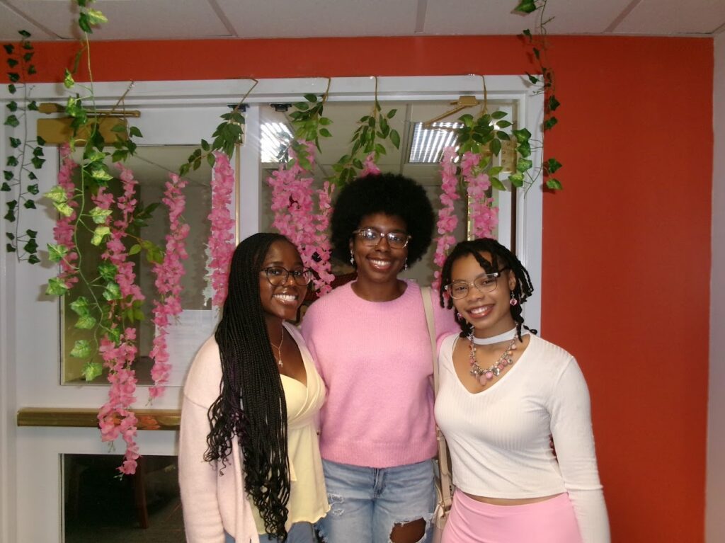Three members of Hopkins' Black Women's Collective at the end-of-year picnic