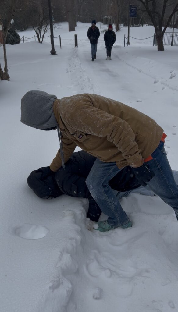 During our Big Snow, two friends and I explored outside, and they made face prints in the snow; meanwhile, I staged this incriminating picture.