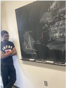 Doing math equations in class at Hopkins