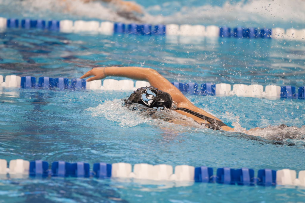 Racing as part of Hopkins' club swim team